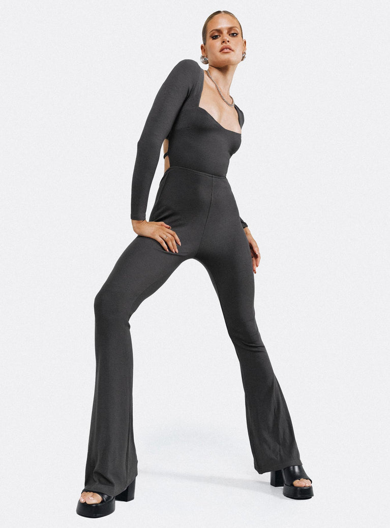 Grey long sleeve jumpsuit Ribbed material Square neckline Cut out at back with tie fastening Good stretch Partially lined