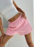 back view of model wearing Princess Polly Mateo Shorts Pink mid-rise 