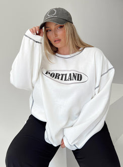 side view of model wearing Princess Polly Portland Oversized Sweatshirt White Curve regular 