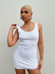 Front view of model wearing  front Princess Polly Asymmetric Neckline  Serkis Mini Dress White