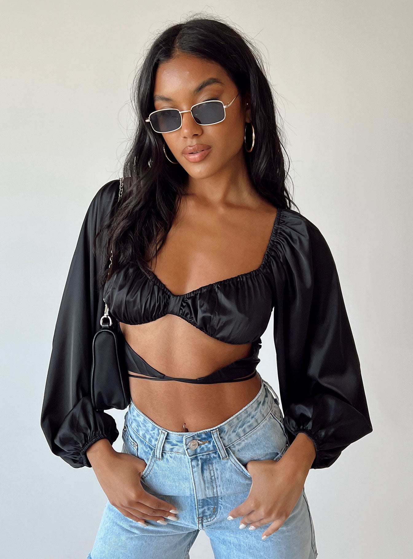 front view of model wearing Princess Polly Nikita Long Sleeve Top Black Full Sleeves Sweetheart 