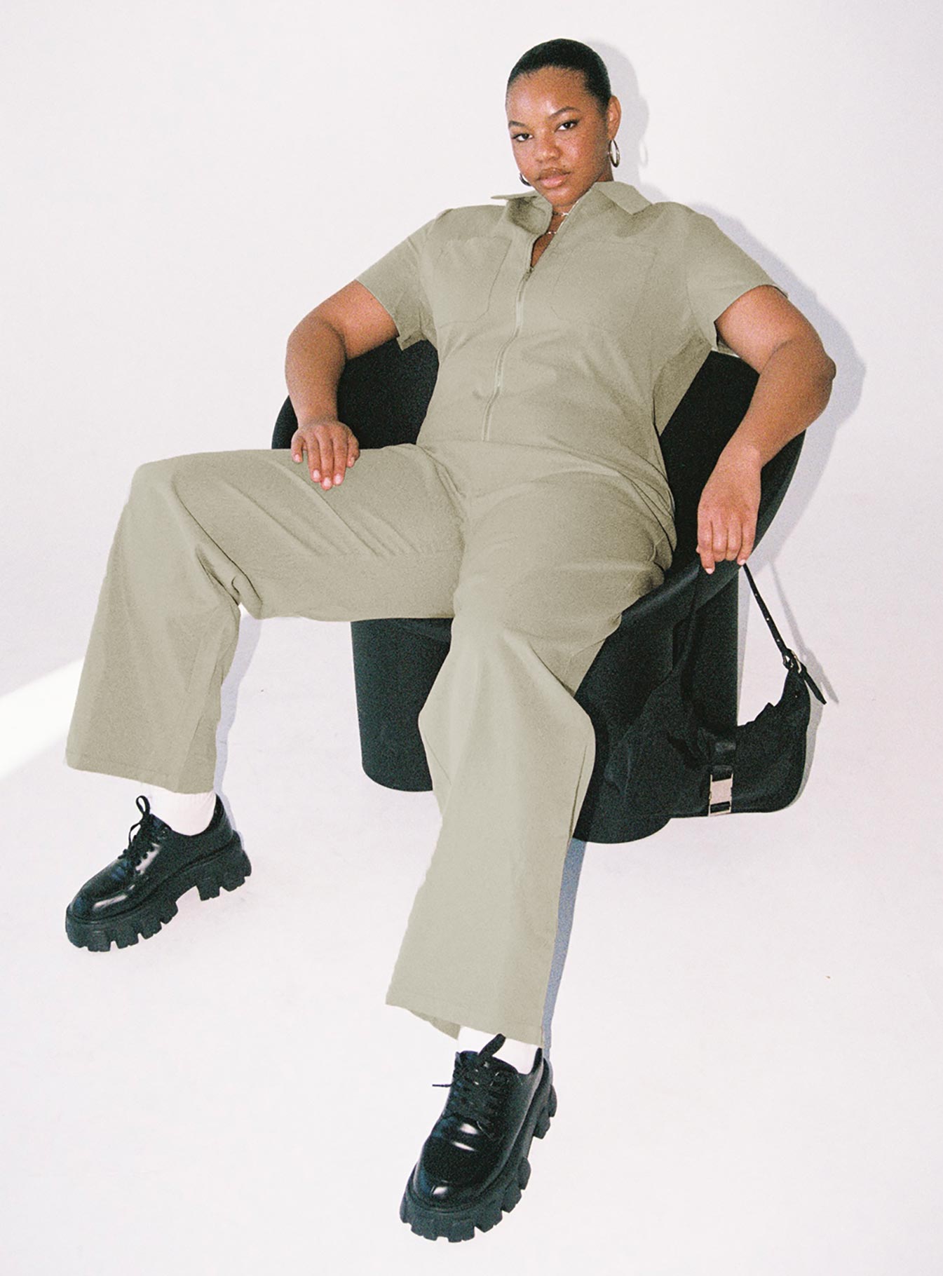 Jumpsuit Classic collar Zip fastening at front Twin chest pockets Straight leg