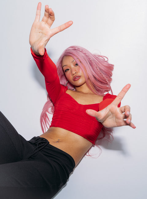 Front view of model wearing  front Princess Polly Three Fourth Sleeves High Neck  Elmore Long Sleeve Top Red