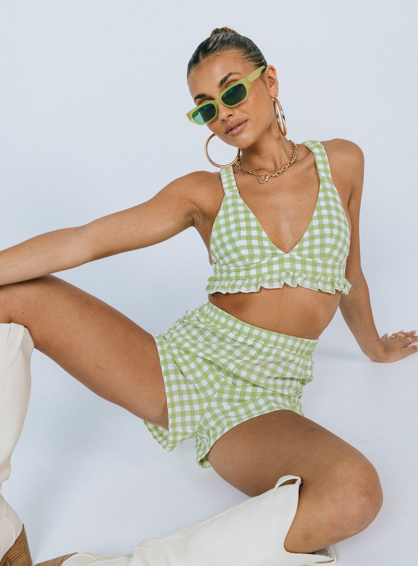 Matching set Check print  Crop top Elasticised straps  Frill hem  Back tie fastening High waisted shorts  Elasticated waistband 