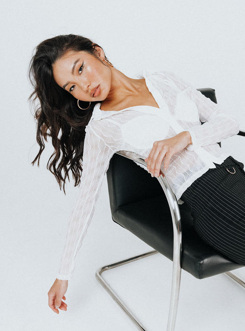 back view of model wearing Princess Polly Seren Long Sleeve Top White 