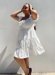 side view of model wearing Princess Polly Daniela Mini Dress White Curve Sweetheart Neckline 