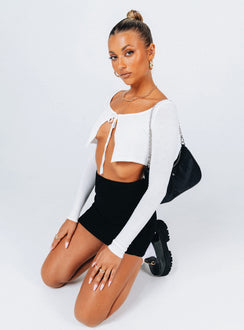 side view of model wearing Princess Polly Reeves Top White 