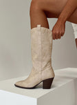 Cowgirl boots Faux leather material  Detail stitching  Mid calf length  Pull tabs  Pointed toe Block heel 