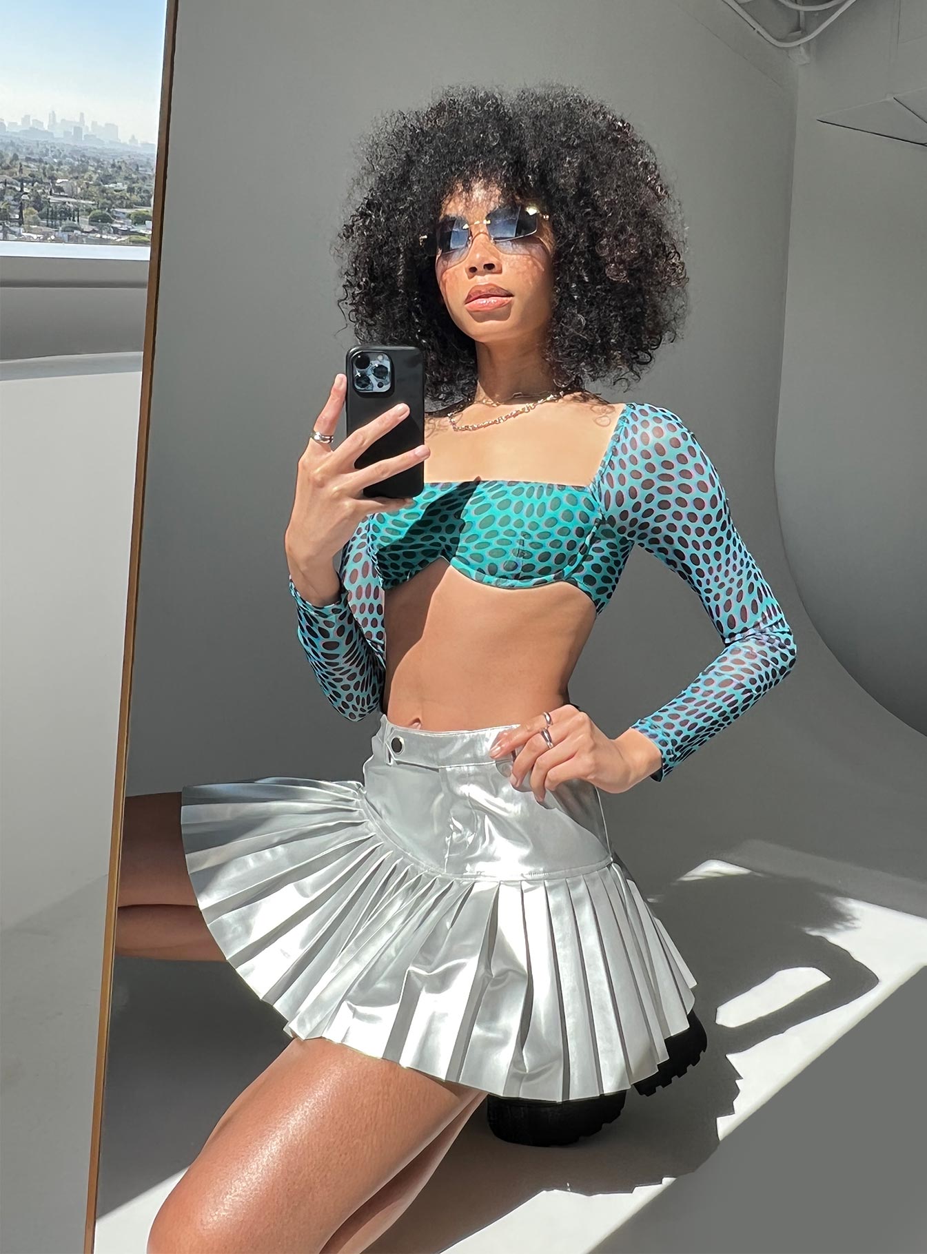   side view of model wearing Princess Polly Cyan PU Mini Skirt Grey 
