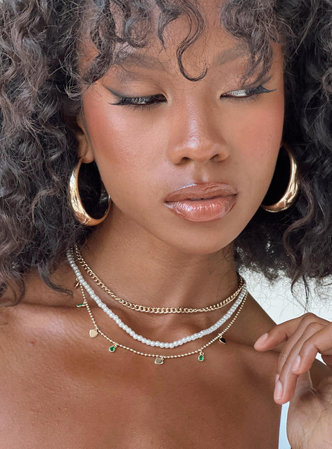 Necklace Gold toned Three chains - these can be worn separately Pearl and gemstone detail Lobster clasp fastening Adjustable lengths