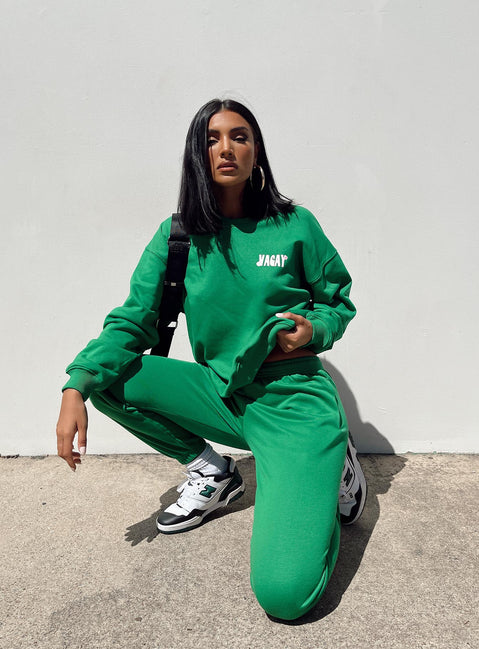 front view of model wearing Princess Polly Club Basic Trackpants Green 
