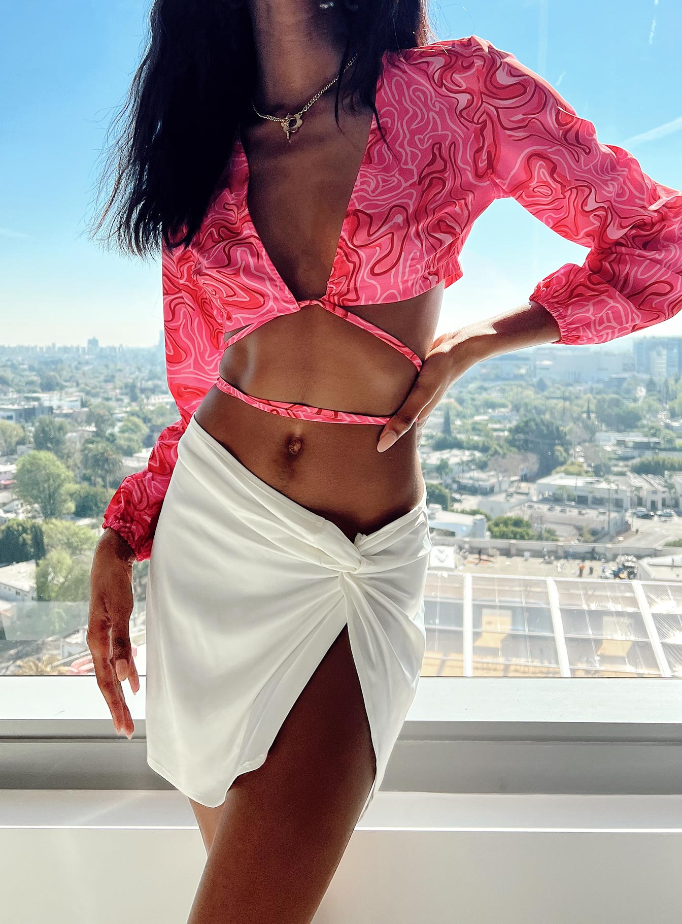 back view of model wearing Princess Polly Nahla Knot Mini Skirt White Mini Skirts 