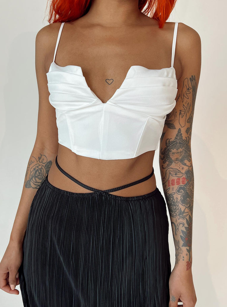 Crop top Silky material  Delicate material - wear with care  Adjustable shoulder straps  Pleated bust  Boning through front  Zip fastening at back  Non-stretch Fully lined 