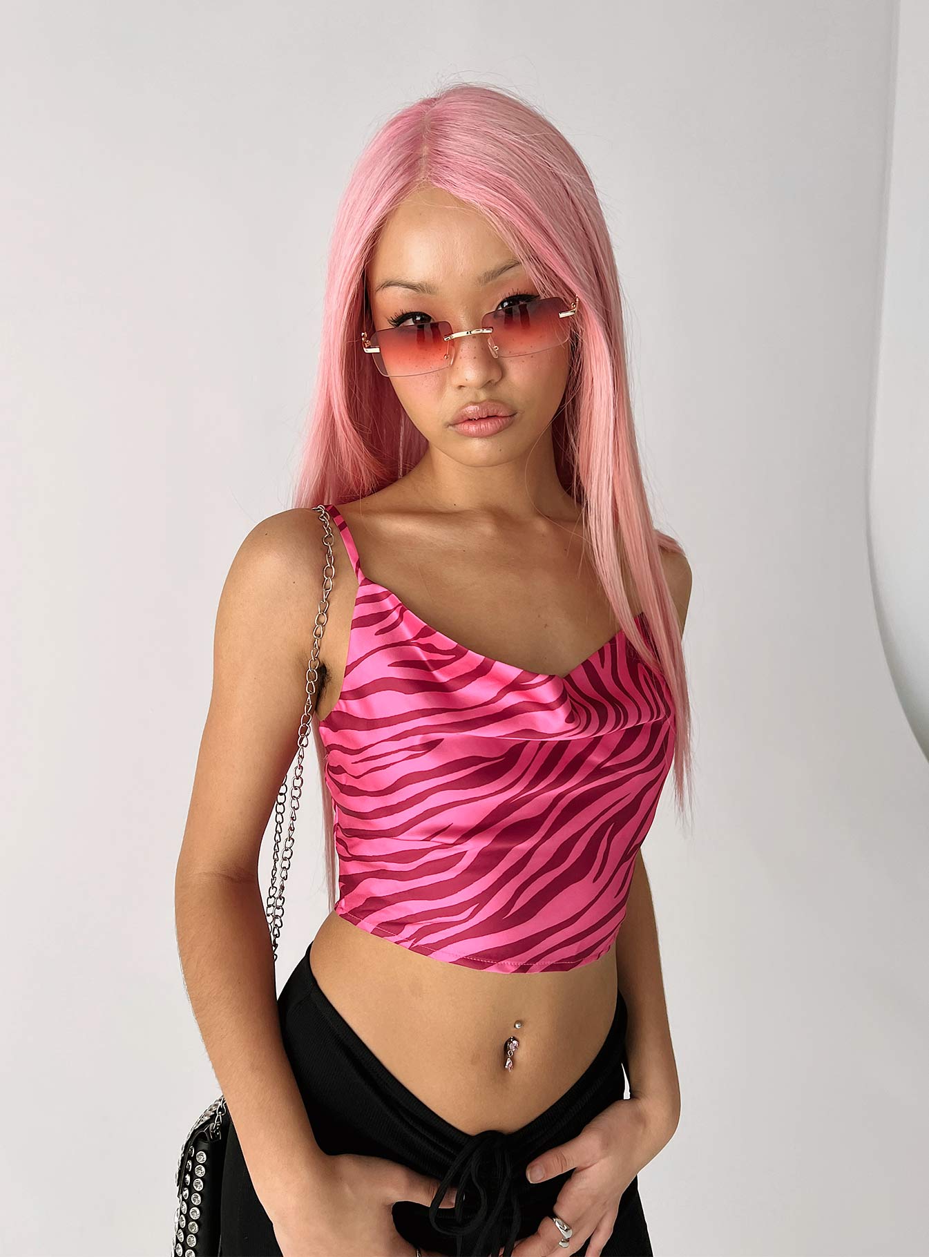 back view of model wearing Princess Polly Gia Top Pink Sleeveless Cowl 