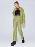 side view of model wearing Princess Polly Harvey PU Pants Green 