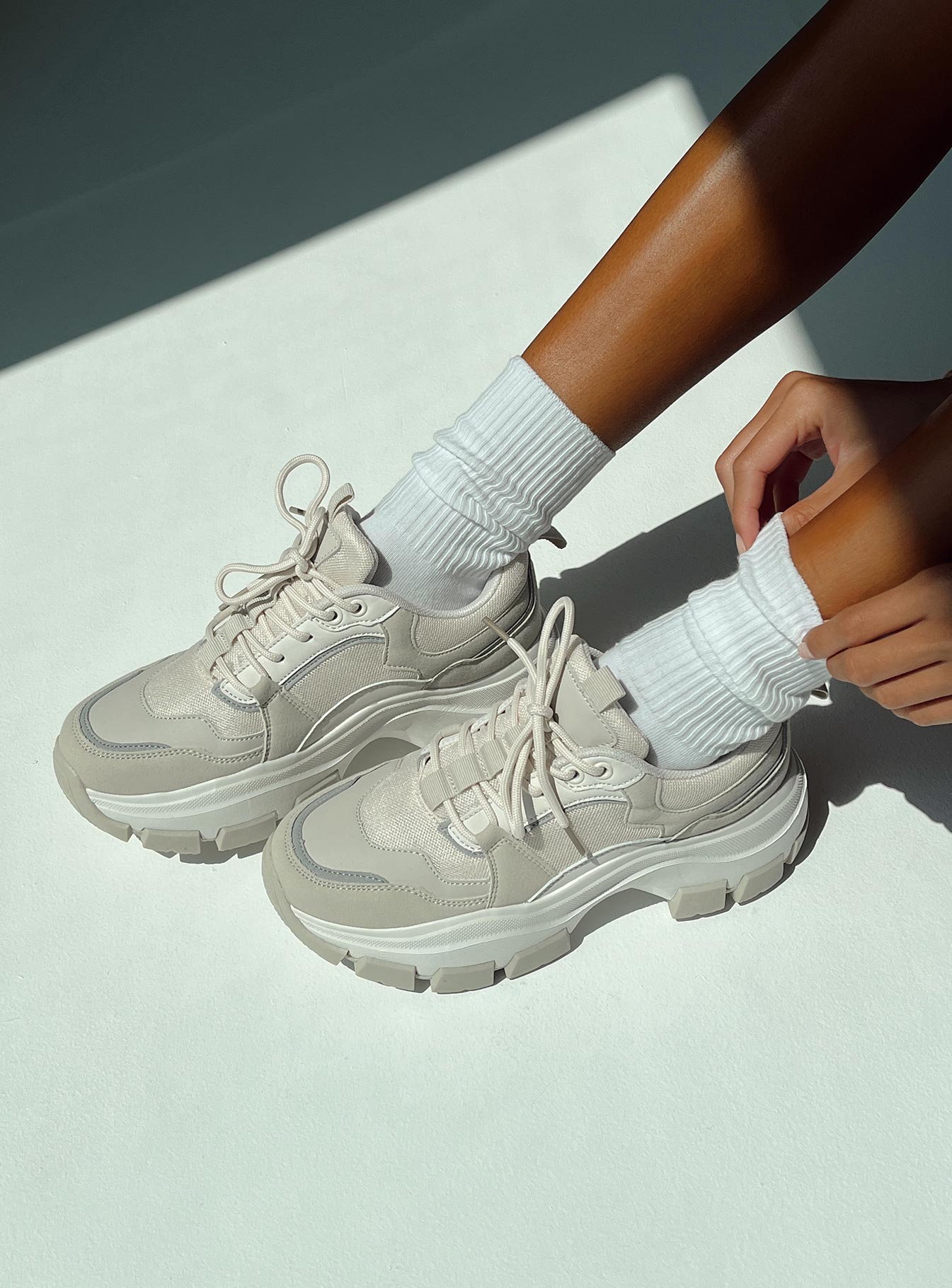 Sneakers Faux leather & mesh material  Chunky design  Rounded toe Lace-up fastening Pull tab at back Platform base Padded upper