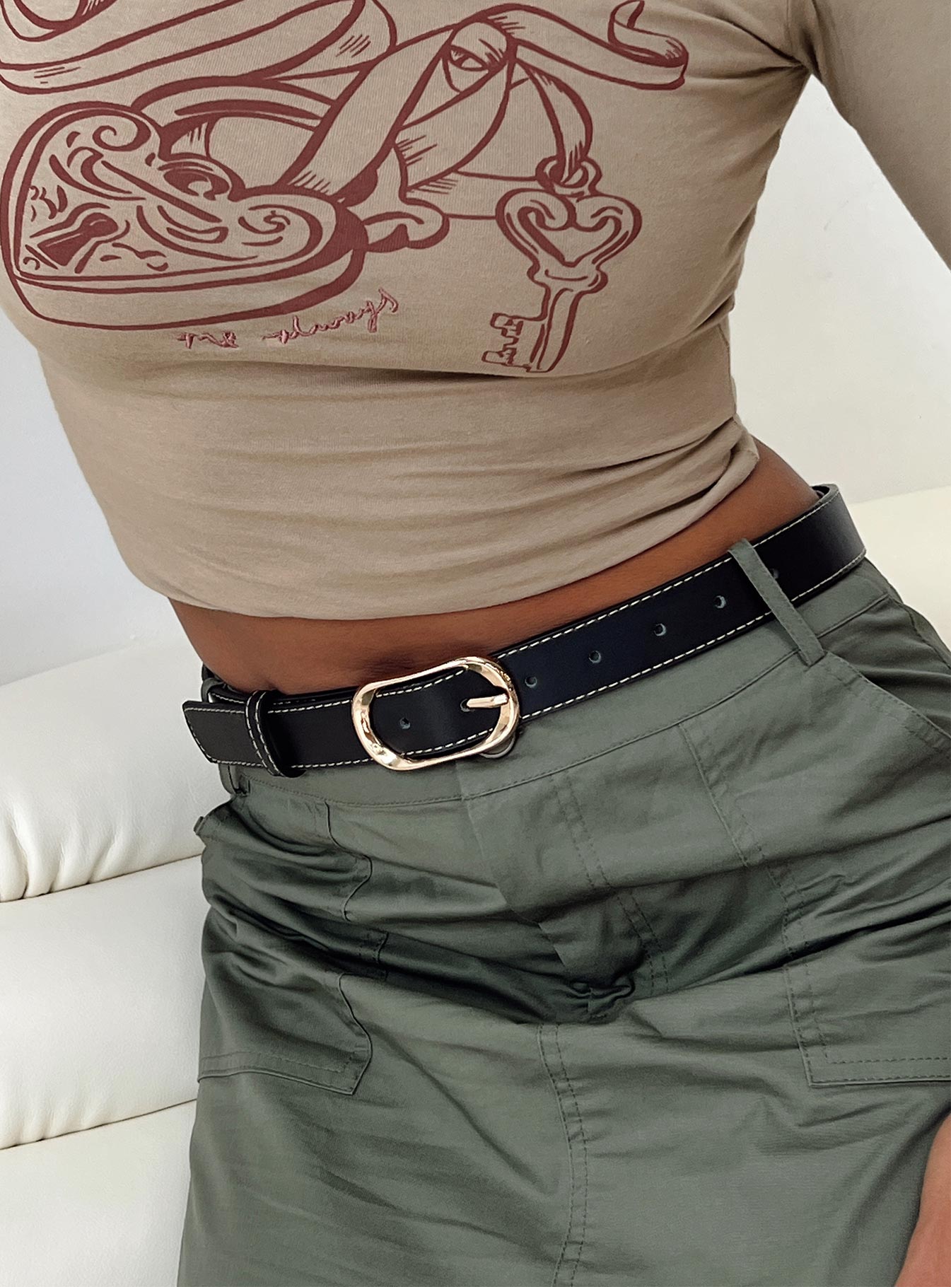 Belt Contrast stitching Faux leather material Gold toned buckle