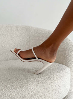 Heels Faux leather Thin double strap upper  Square toe  Shaved block heel Padded footbed 