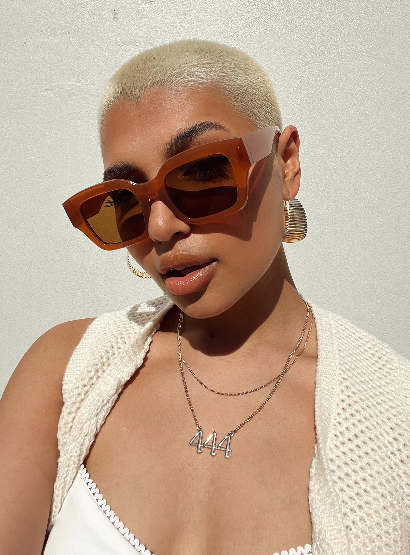 Brown sunglasses Oversized frame  Brown tinted lenses Moulded nose bridge  