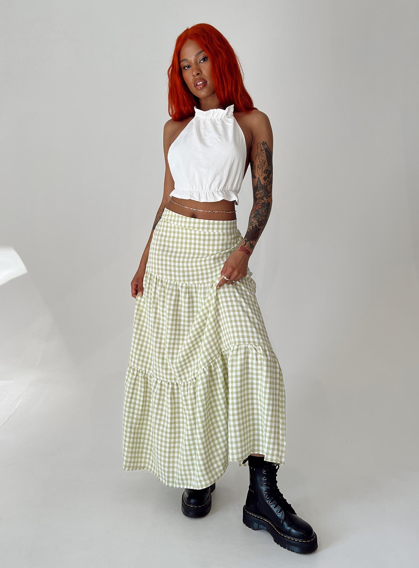   side view of model wearing Princess Polly Rebeccah Maxi Skirt Green Maxi 