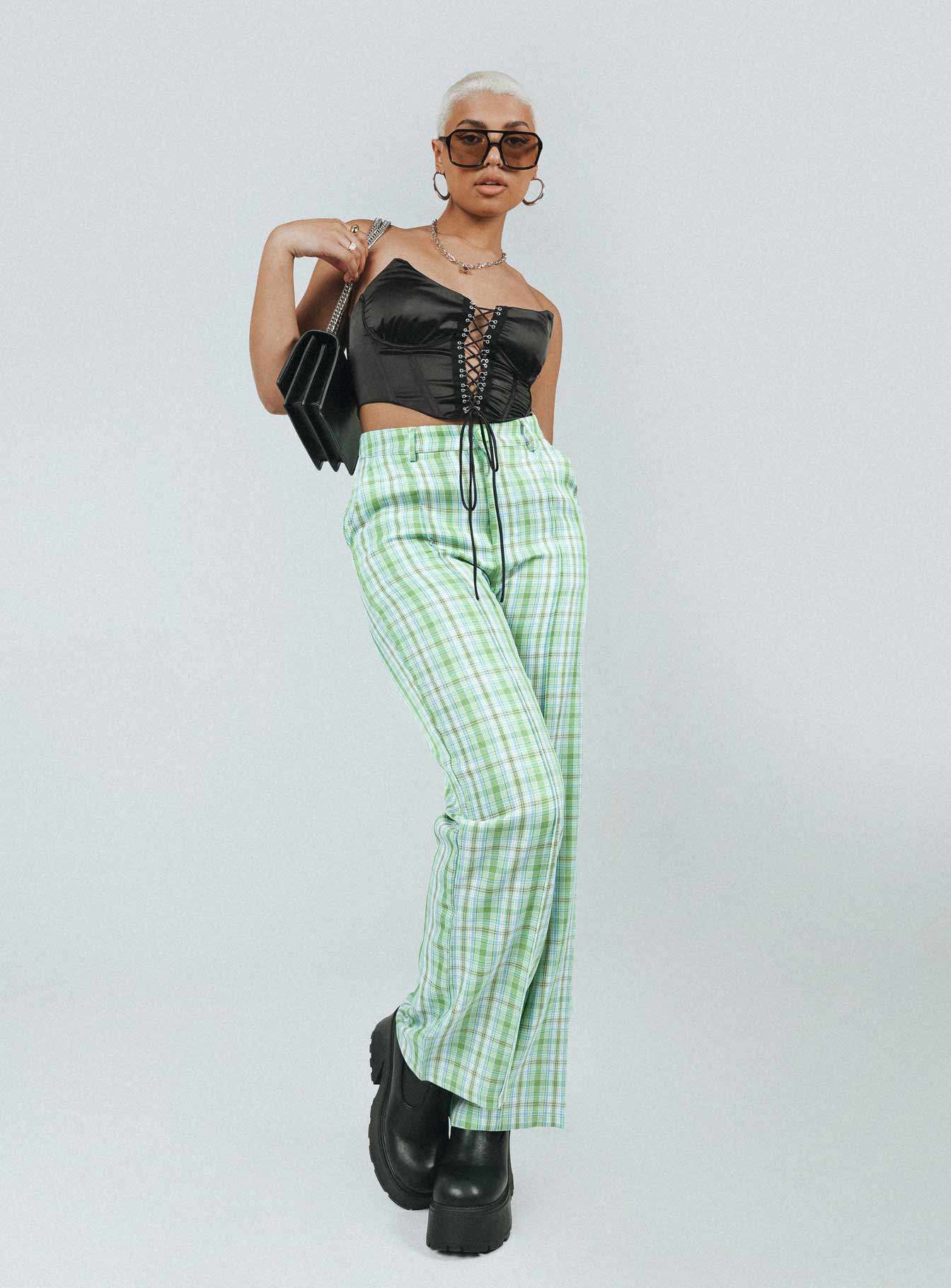 side view of model wearing Princess Polly Wiluna Pants Green 