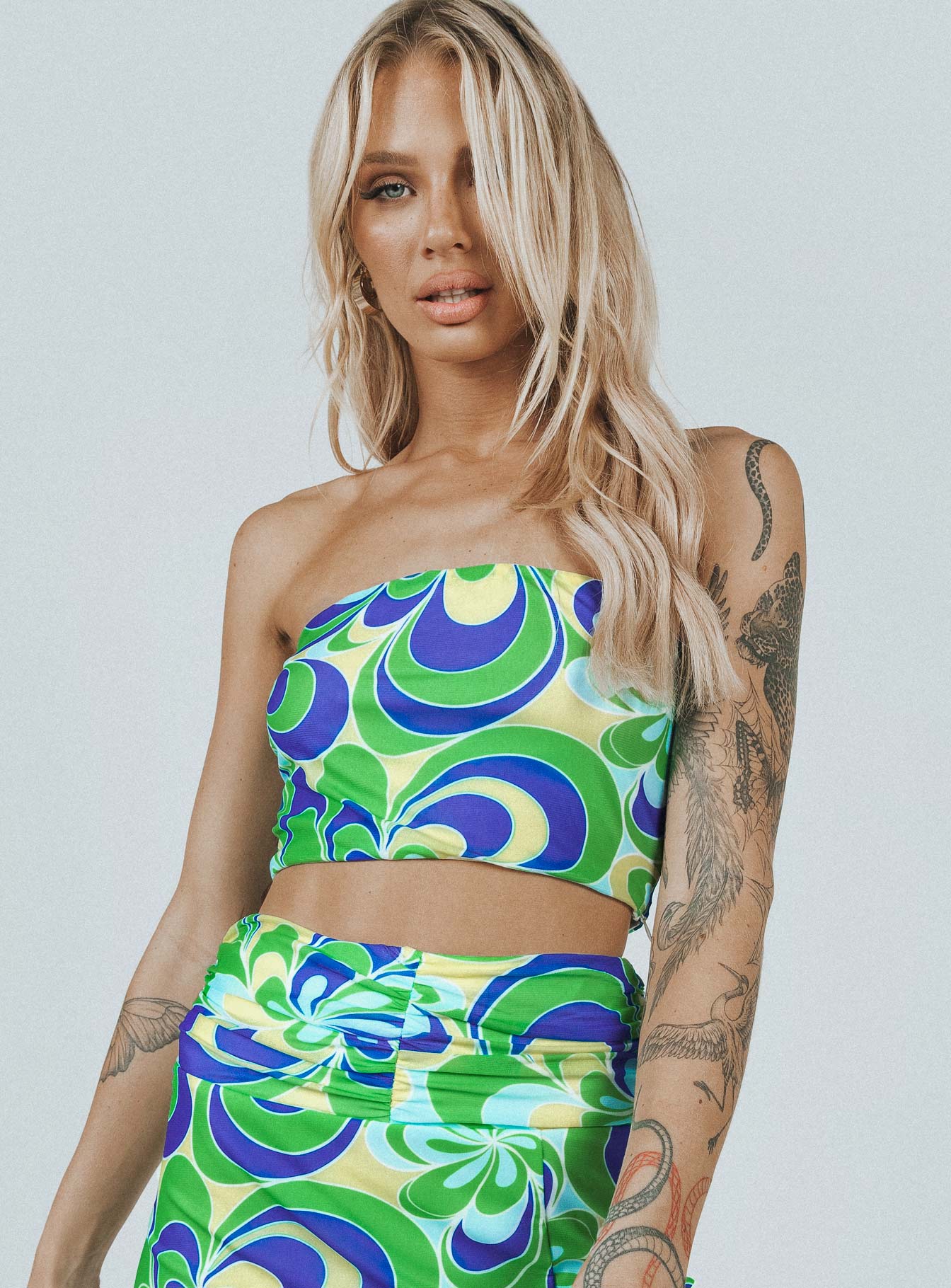 front view of model wearing Princess Polly Attwood Top Green Floral 