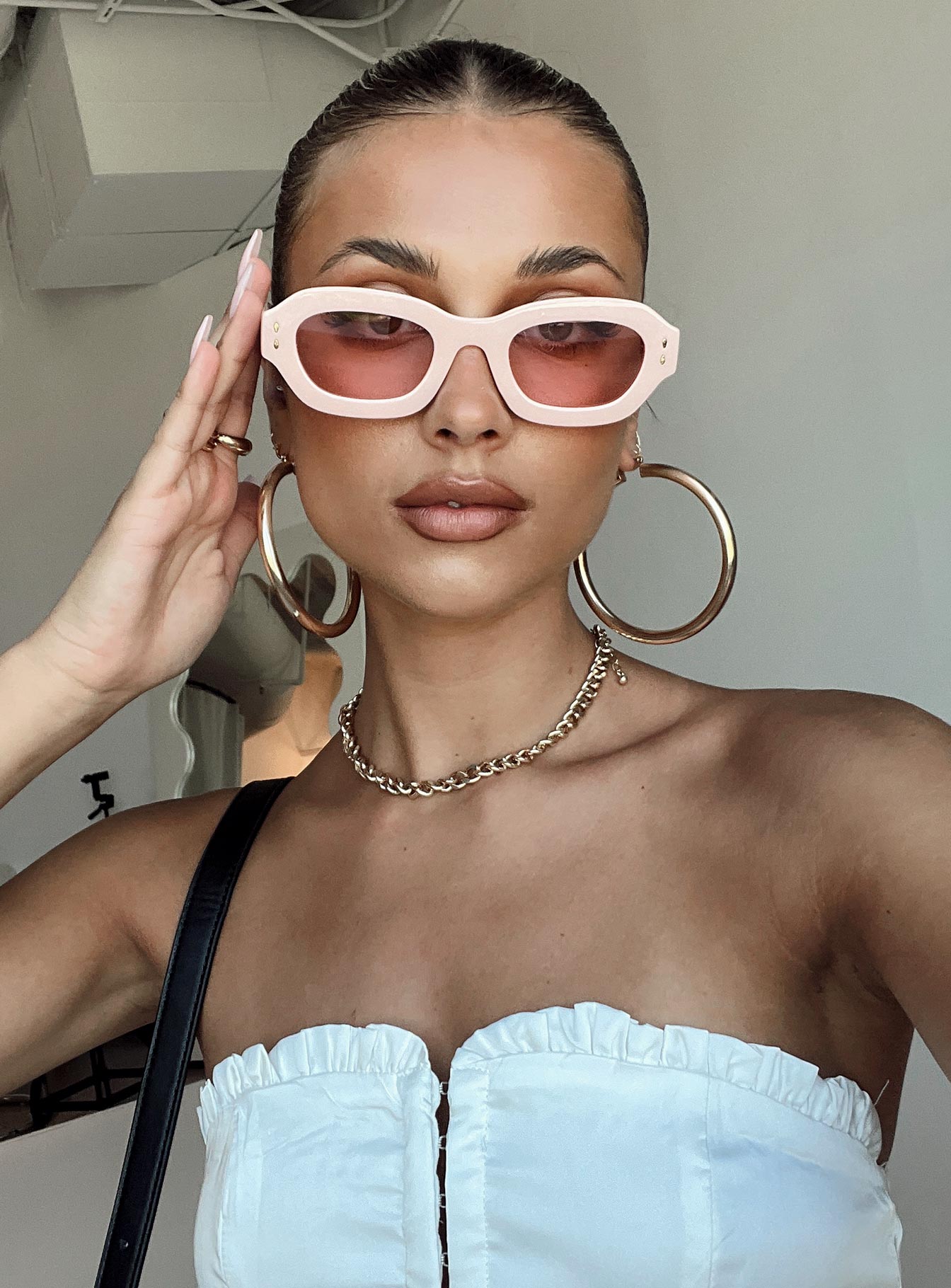 Sunglasses  80% PC  20% AC UV 400 Pink tinted lenses  Moulded nose bridge 