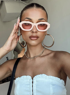 Sunglasses  80% PC  20% AC UV 400 Pink tinted lenses  Moulded nose bridge 