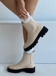 Boots Boots Faux leather material Platform base Rounded toe Elasticated gussets Pull tab at back