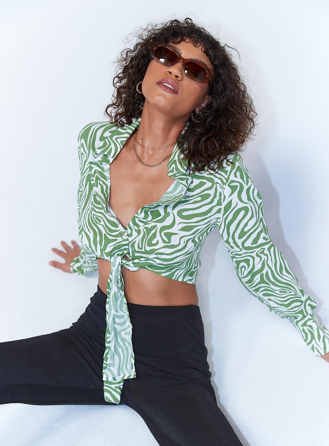 side view of model wearing Princess Polly Winslet Long Sleeve Top Green 