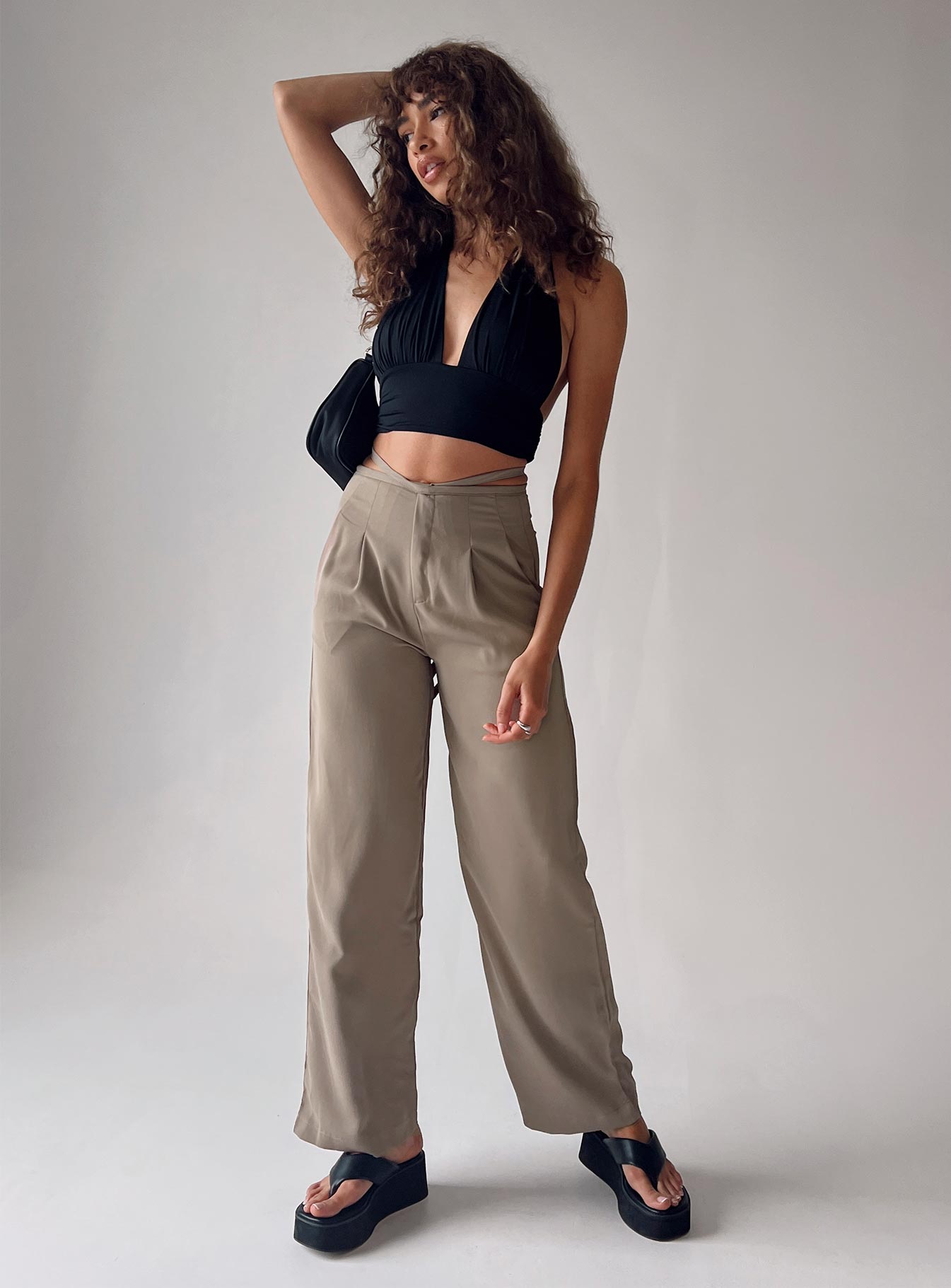 side view of model wearing Princess Polly Rodney Pants Beige 