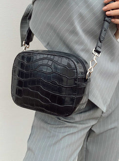 Crossbody bag  Princess Polly Exclusive Faux leather material  Croc print  Removable & adjustable crossbody strap  Silver-toned hardware  Two internal pockets  Flat base 