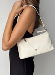 Shoulder bag Fixed strap Gold-toned hardware Zip fastening Two internal pockets Flat base