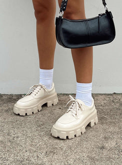 Platform shoes Faux leather Lace up fastening Chunky tread Padded ankle 