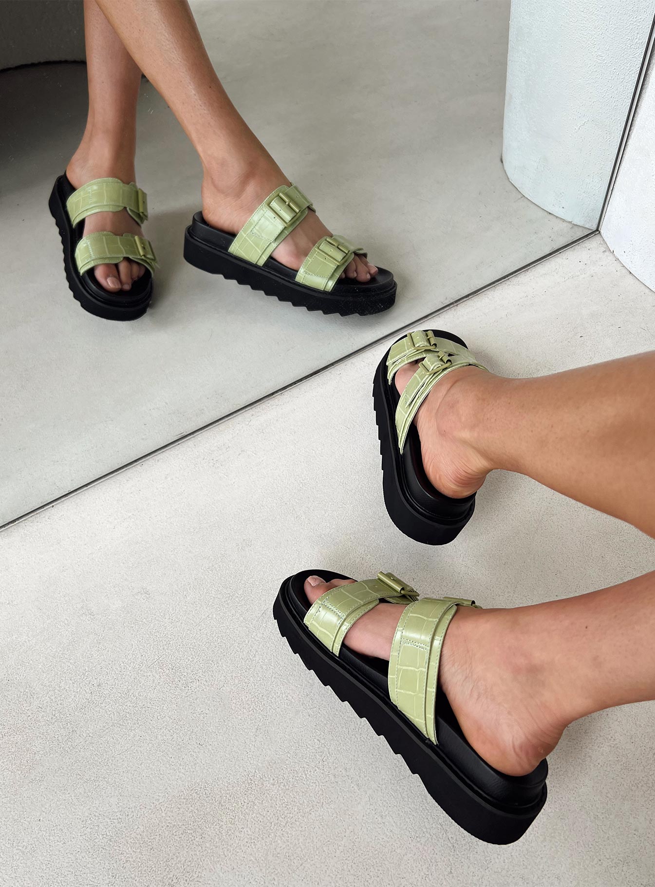 Black and green sandals Double upper strap Both adjustable Chunky treaded sole Padded footbed