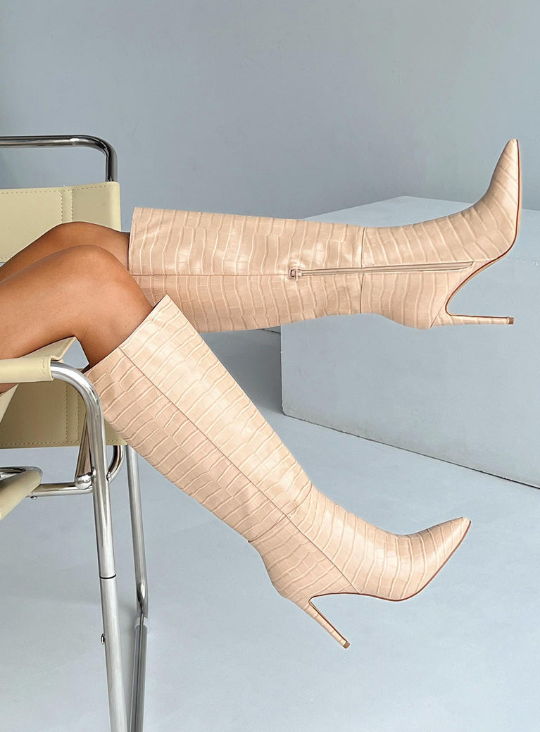 Boots Faux croc leather  Knee-high  Stilleto style heel Pointed toe  Padded inside  Exposed zip on inner side 