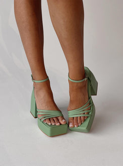 Heels  Princess Polly Exclusive Faux leather material  Strappy upper  Ankle wrap strap  Buckle fastening  Platform base  Block heel 