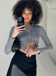 side view of model wearing Princess Polly Tavi Long Sleeve Top Black 