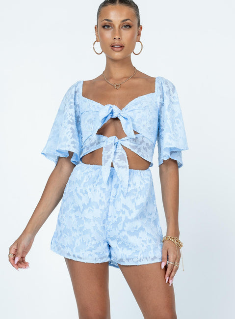 Romper Stitched floral print  Sheer material  Elasticated shoulders  Double tie front fastening  Elasticated waist  Invisible zip fastening at back 
