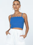 Blue slim fitting crop top Soft knit material Adjustable shoulder straps