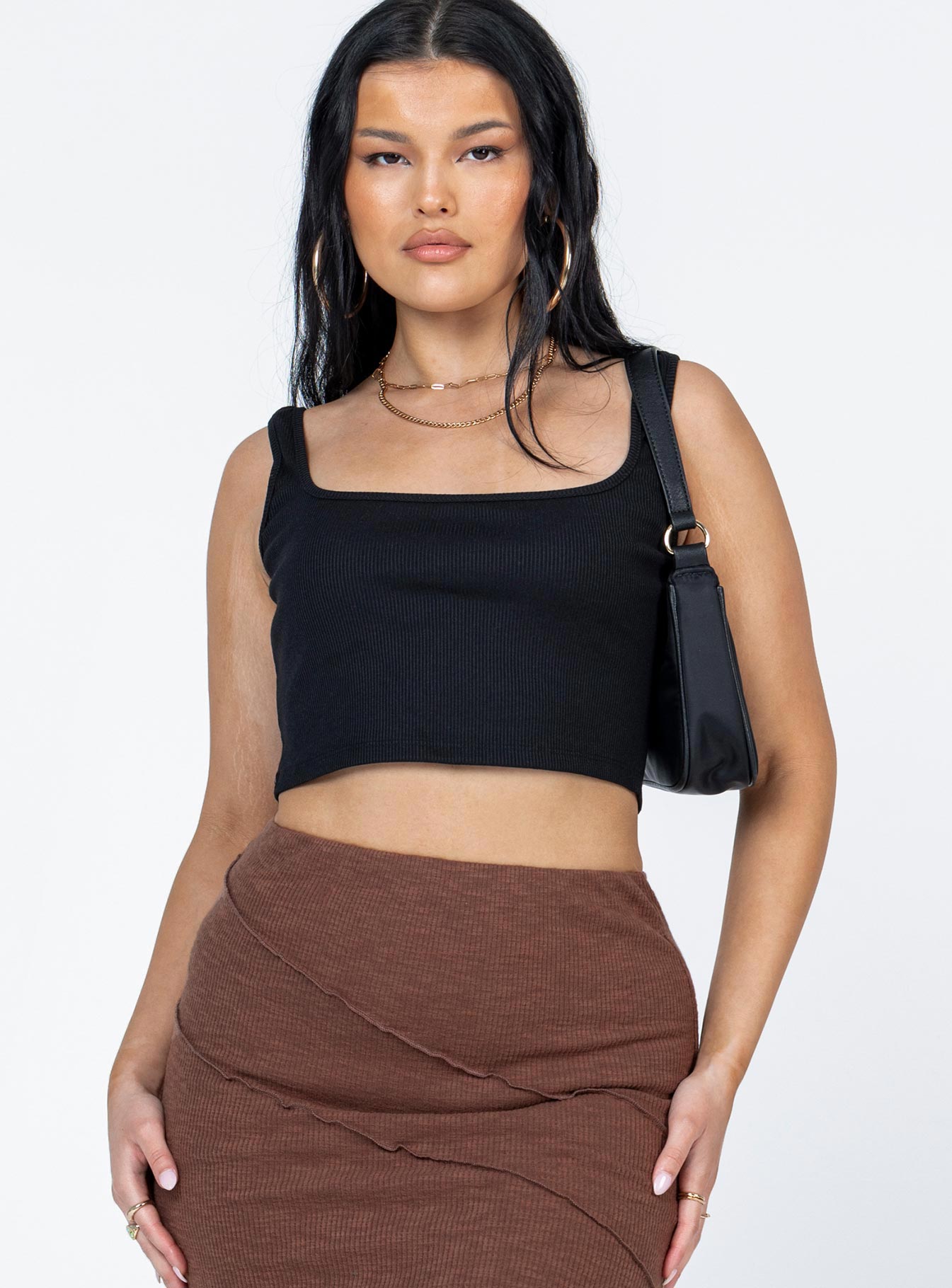 front view of model wearing Princess Polly Jace Top Black Sleeveless Square Neck 