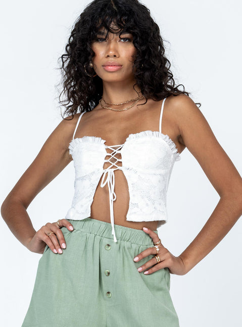 Front view of model wearing  front Princess Polly Sleeveless Sweetheart  Marloe Top White