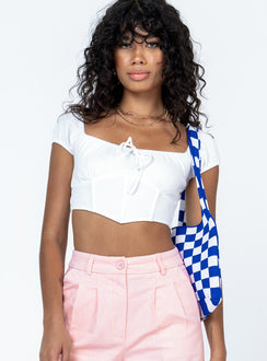 Front view of model wearing  front Princess Polly Sleeveless Square Neck  Baker Top White