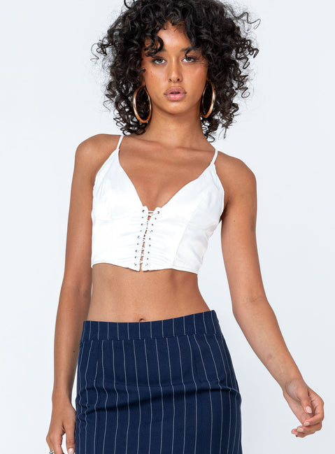 front view of model wearing Princess Polly Ashbourne Top White Sleeveless Plunger 