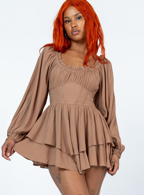 Romper Elasticated neckline  Boning through waist Shirred waistband at back  Layered skirt 