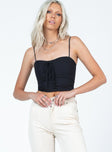 front view of model wearing Princess Polly Durant Top Black Sleeveless Sweetheart 