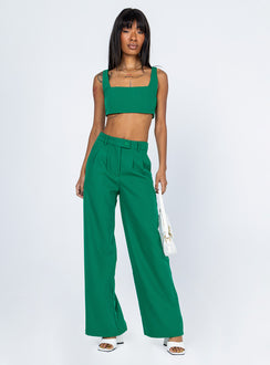 Matching set Crop top Fixed straps Invisible zip fasting at side High waisted pants Wide relaxed leg Belt loops at waist Zip & button fastening Lined top