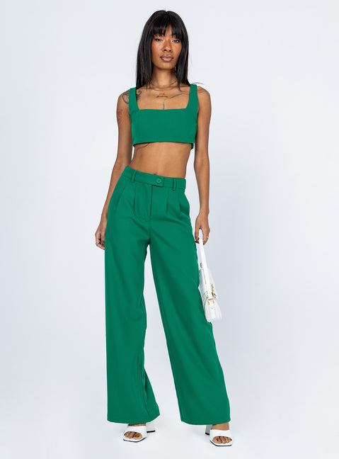 Matching set Crop top Fixed straps Invisible zip fasting at side High waisted pants Wide relaxed leg Belt loops at waist Zip & button fastening Lined top