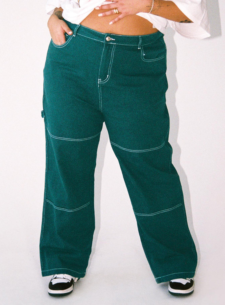 Front view of model wearing  front Princess Polly Mid Rise  Copeland Jeans Green Curve