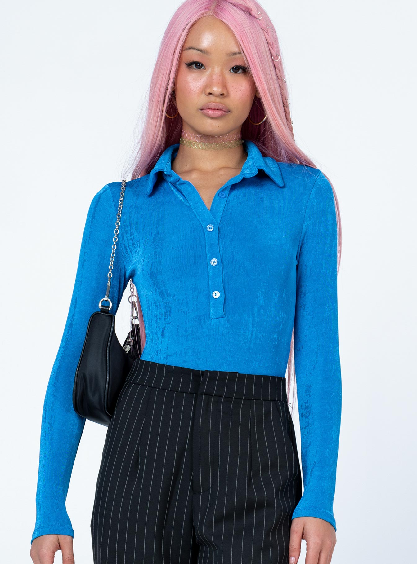 front view of model wearing Princess Polly Elody Long Sleeve Bodysuit Blue Full Sleeves V-Neck 